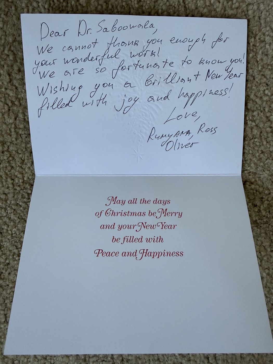 Handwritten holiday thank-you note to Dr. Saboowala from Rumyana, Ross & Oliver
